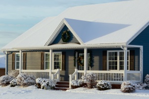 A house with a snow covered roof